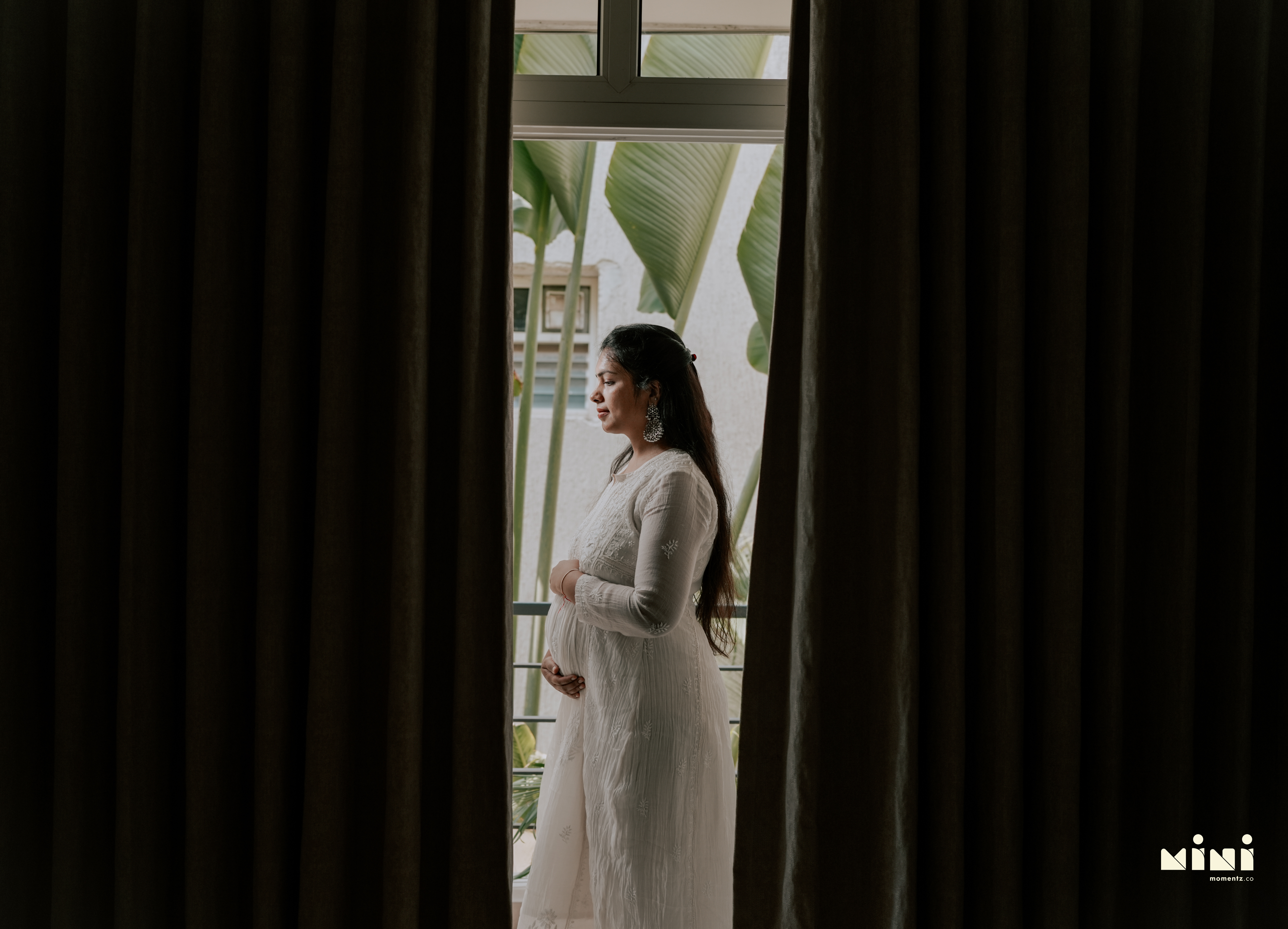 South Indian maternity photographer Leicester — standing by window, Mini Momentz