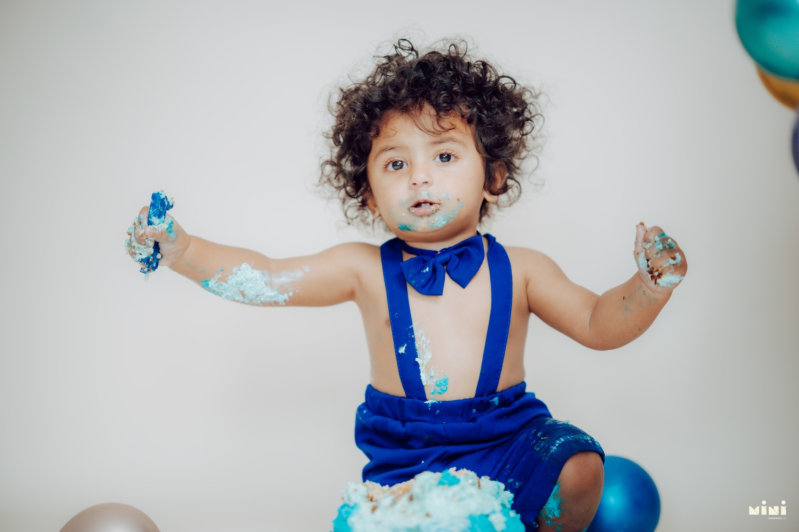 Baby boy cake smash photography London — first birthday joyful moment, Mini Momentz